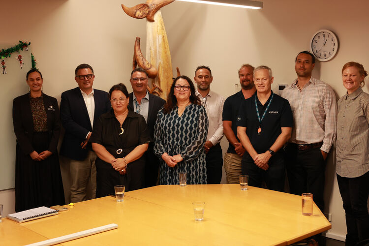Group of People Gathered Around a Large Table